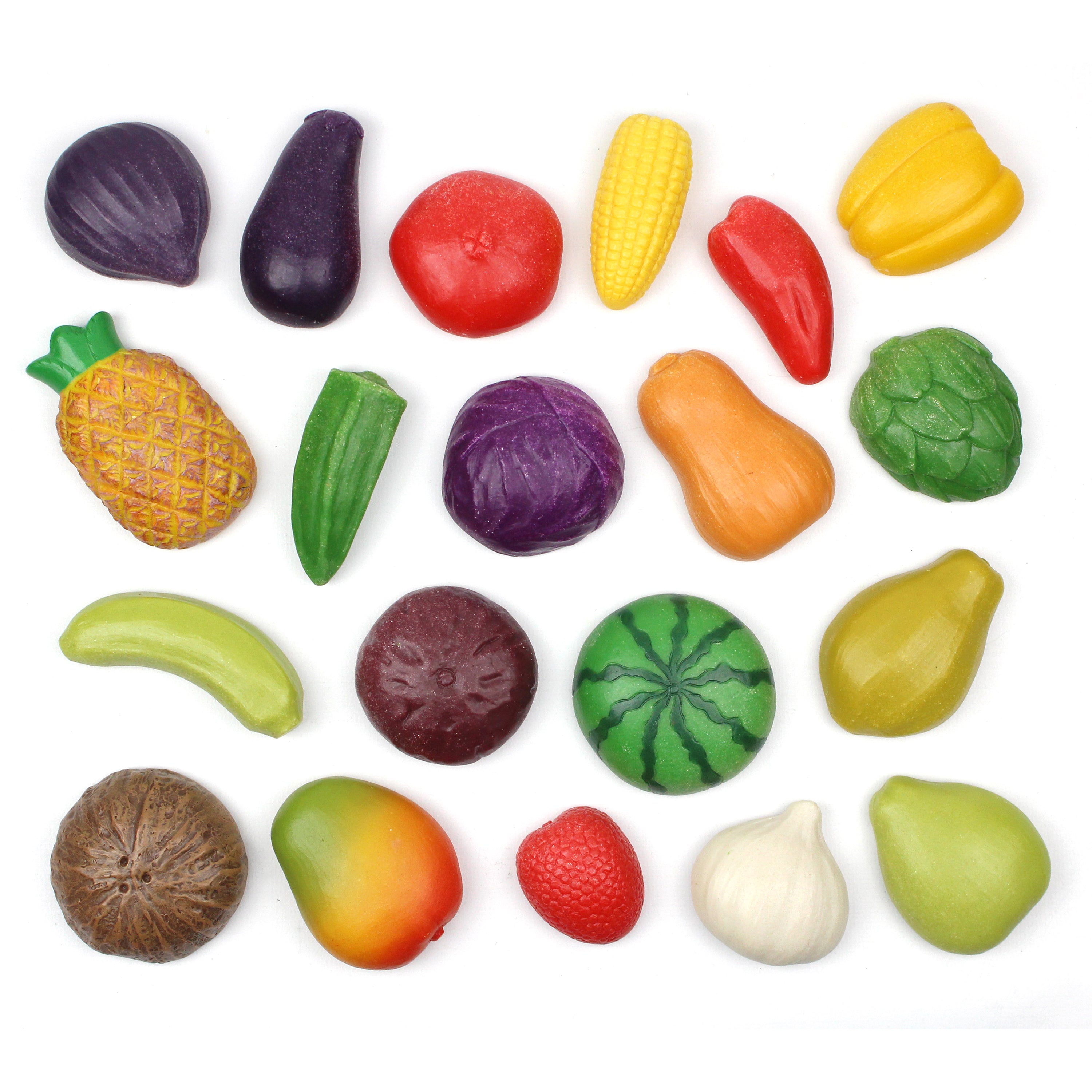 Assorted colorful stones shaped like fruits and vegetables on a white background