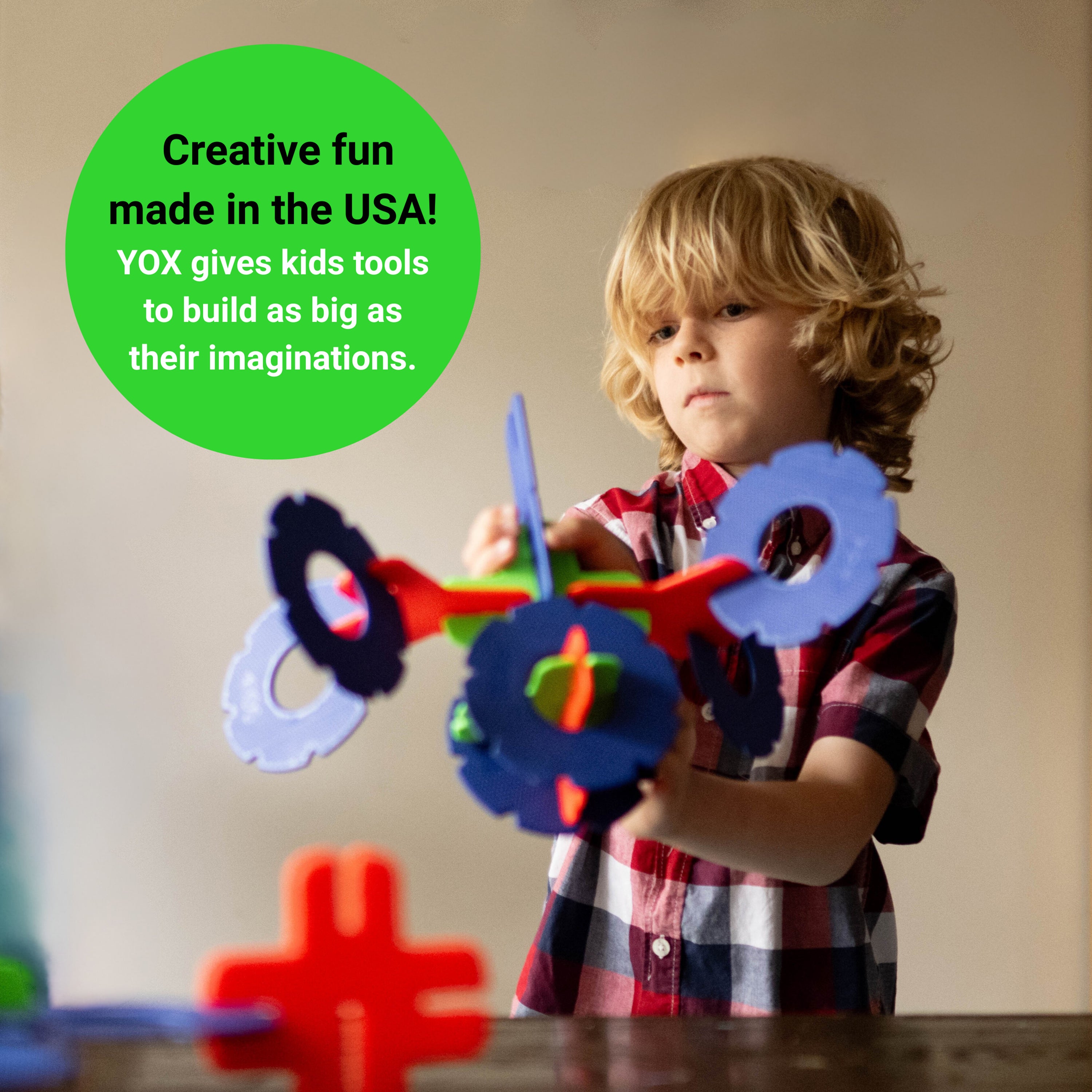 Child playing with colorful building toys, with text about creative fun made in the USA.