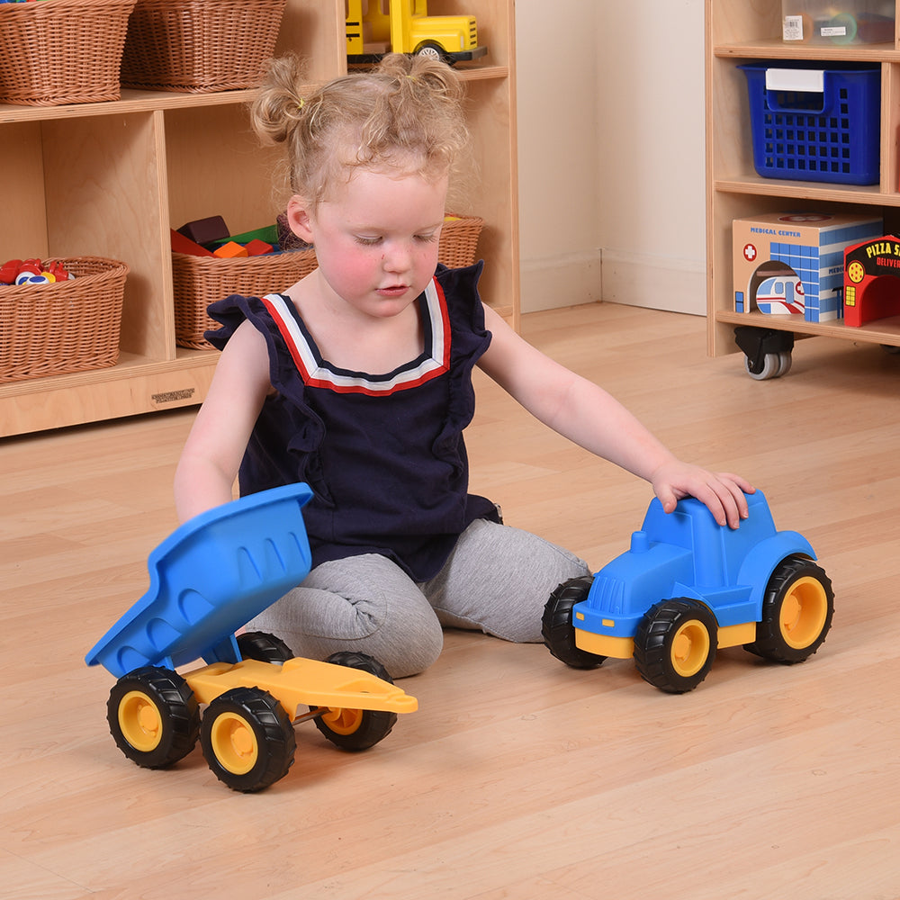 Kids playing with toy trucks deals