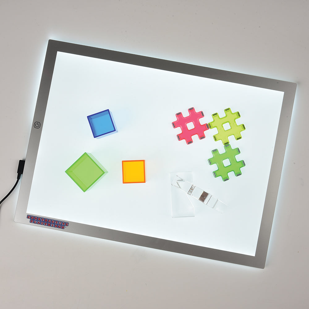  Constructive Playthings Mesa de luz LED para niños con  superficie iluminada y estante de almacenamiento : Hogar y Cocina